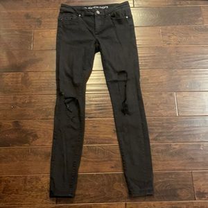 VS black mid rise leggings has a feel of jean material to them